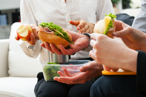 People eating a healthy lunch.