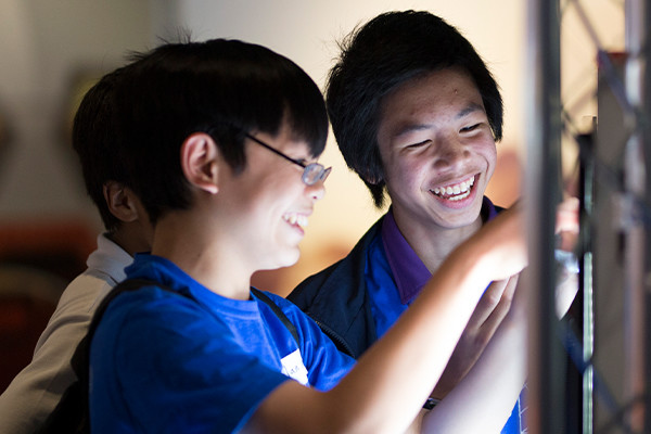 Two students from the Scitech gifted and talented program laughing together