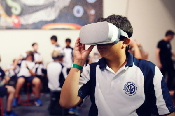 A student wearing a VR headset.