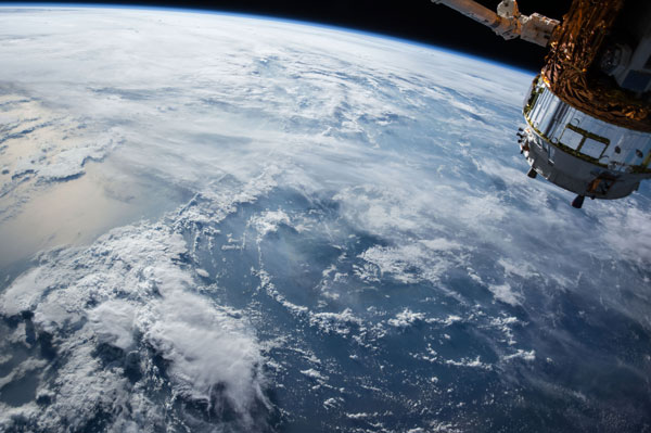 View of the earth from space with cloud cover