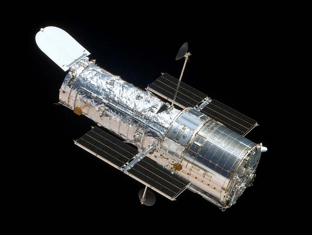 The Hubble Space Telescope floating in space