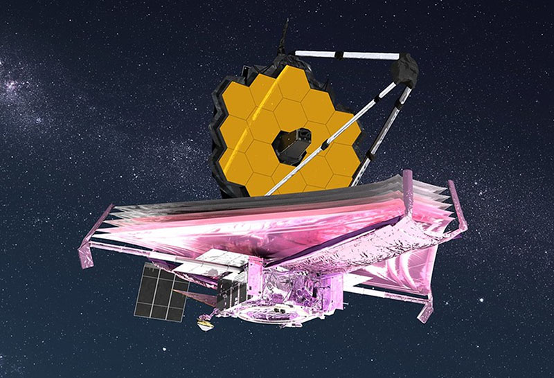 The James Webb Space Telescope, with delicate sunshield on top. The sun shield is made up of yellow, honeycombed-hexagon shapes.