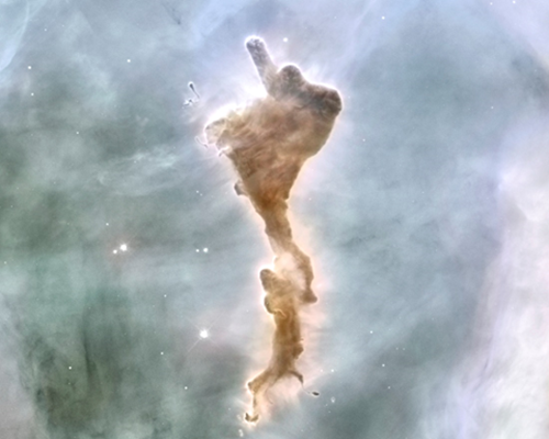 A Hubble Telescope image of the Eta Carina sub-cloud known as 'the Defiant Finger' - but rather than a rude gesture, APOD astronomers describe it as "it could be perceived as a superhero flying through a cloud, arm up, with a saved person in tow below"