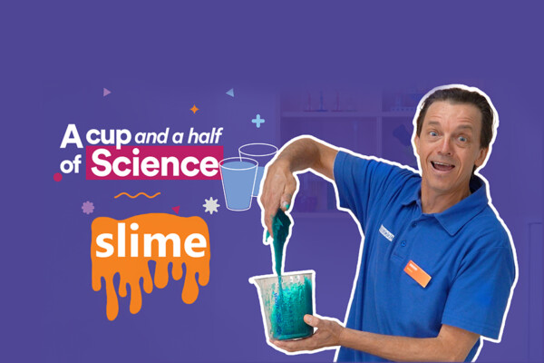 Adam Bennett holding blue slime for the Psylliy Slime science at home video